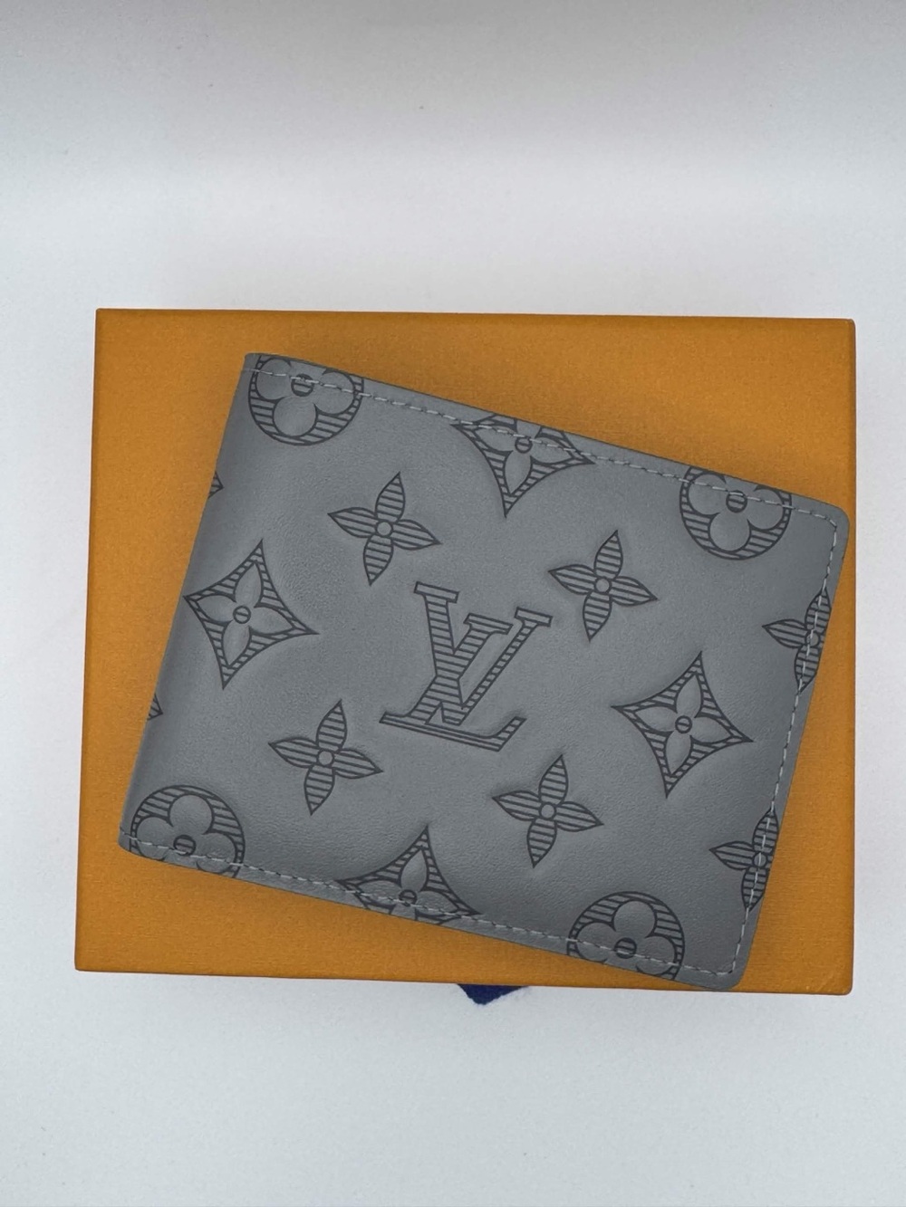 Louis Vuitton Gray Embossed Monogram Bi-Fold Wallet